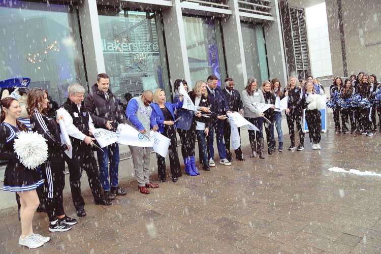 Scene from the GVSU Laker Store ribbon-cutting amidst a snowstorm.