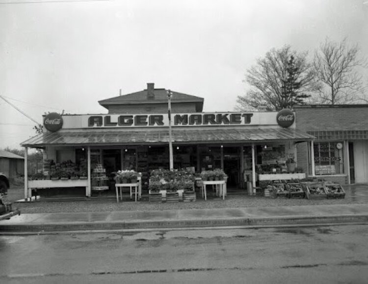 A photo from the Grand Rapids History Center archives shows the Alger Market in May 1954.