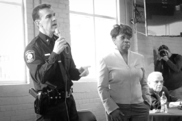 Chief Rahinsky and Mari Beth Jelks speak about the traffic stop study during a public meeting.
