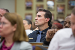 New police chief David Rahinsky listens during a city commission meeting.