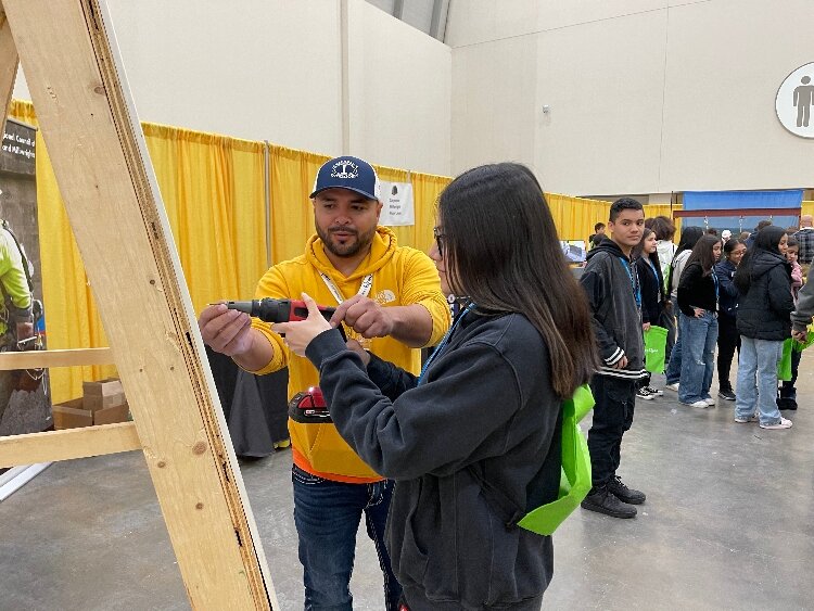 Students learn about careers in the building trades at MiCareerQuest.