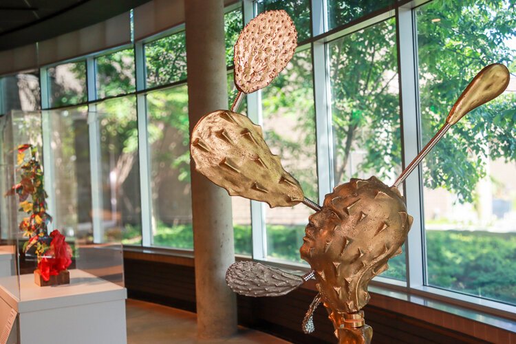 (from right to left) Salvador Jimenez-Flores. Nopal Espacial/Space Cactus (detail), 2019. Courtesy of the artist. Layo Bright. Luffa Acutangula (Loofah), 2019. From the collection of Daniel Nguyen, MD, MBA.