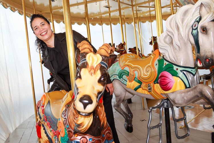 Stevie Hornyak, exhibits manager at GRPM, views the carousel as a conduit for community-building.