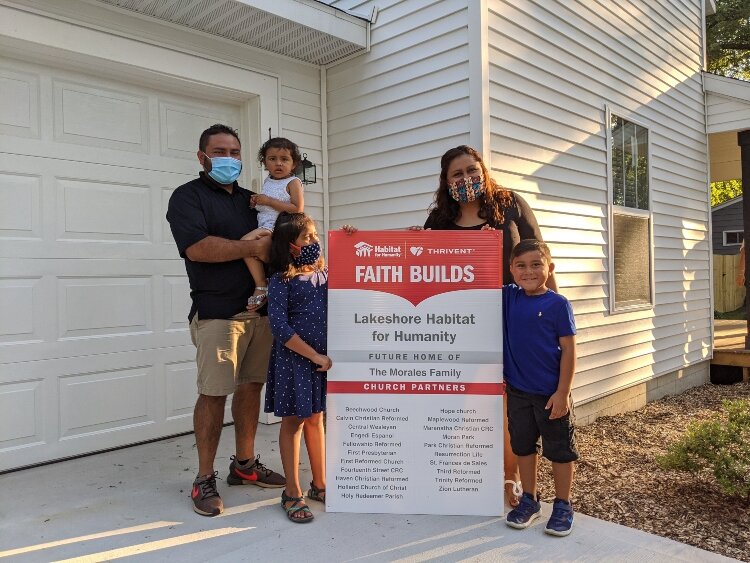 Lakeshore Habitat for Humanity, Thrivent Financial and 22 area churches came together to build a new home for the Morales family.