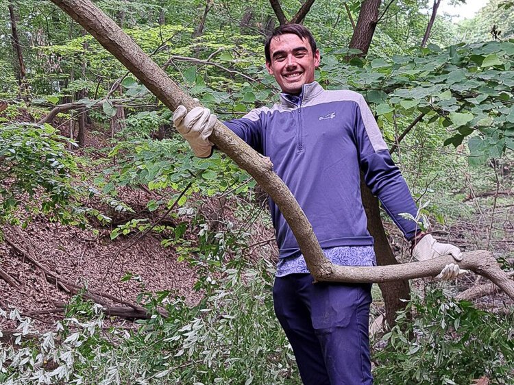 A volunteer helps out at Ken-O-Sha Park. 