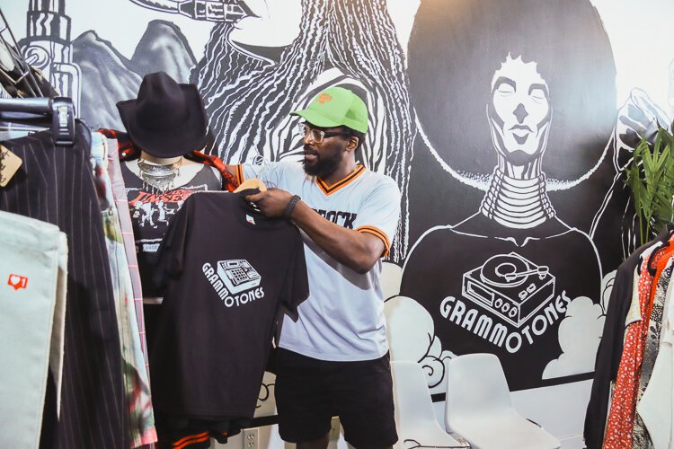 Brandon Copeland taking a moment to merchandise Grammotones.