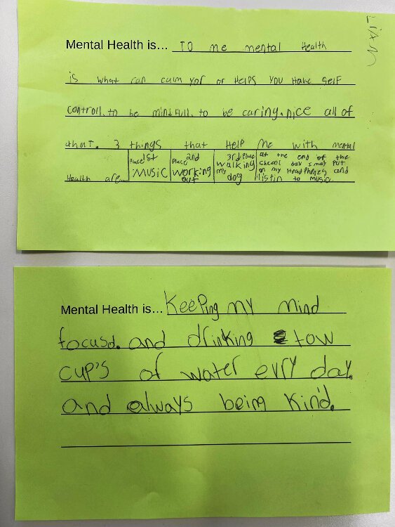Notes from children describing what mental health means to them. Part of HealthBar's school nursing services includes health education.