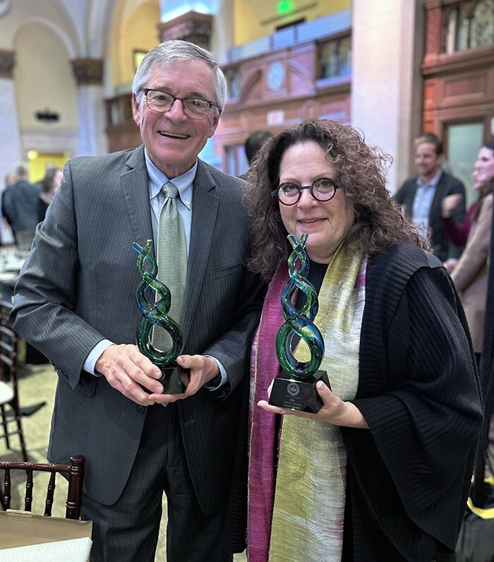 KCAD Professor Gayle DeBruyn and former Grand Rapids Mayor George Heartwell with their awards.