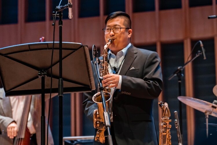 Hope College professor Jordan VanHemert performs.