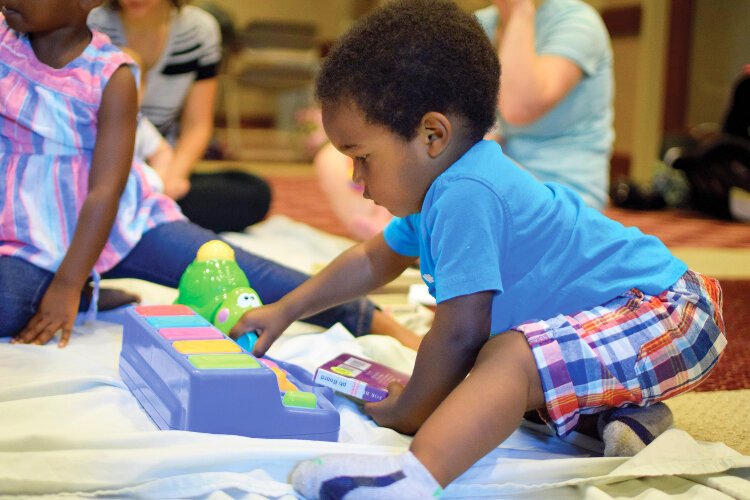 A child plays at a recent Kent District Library event.