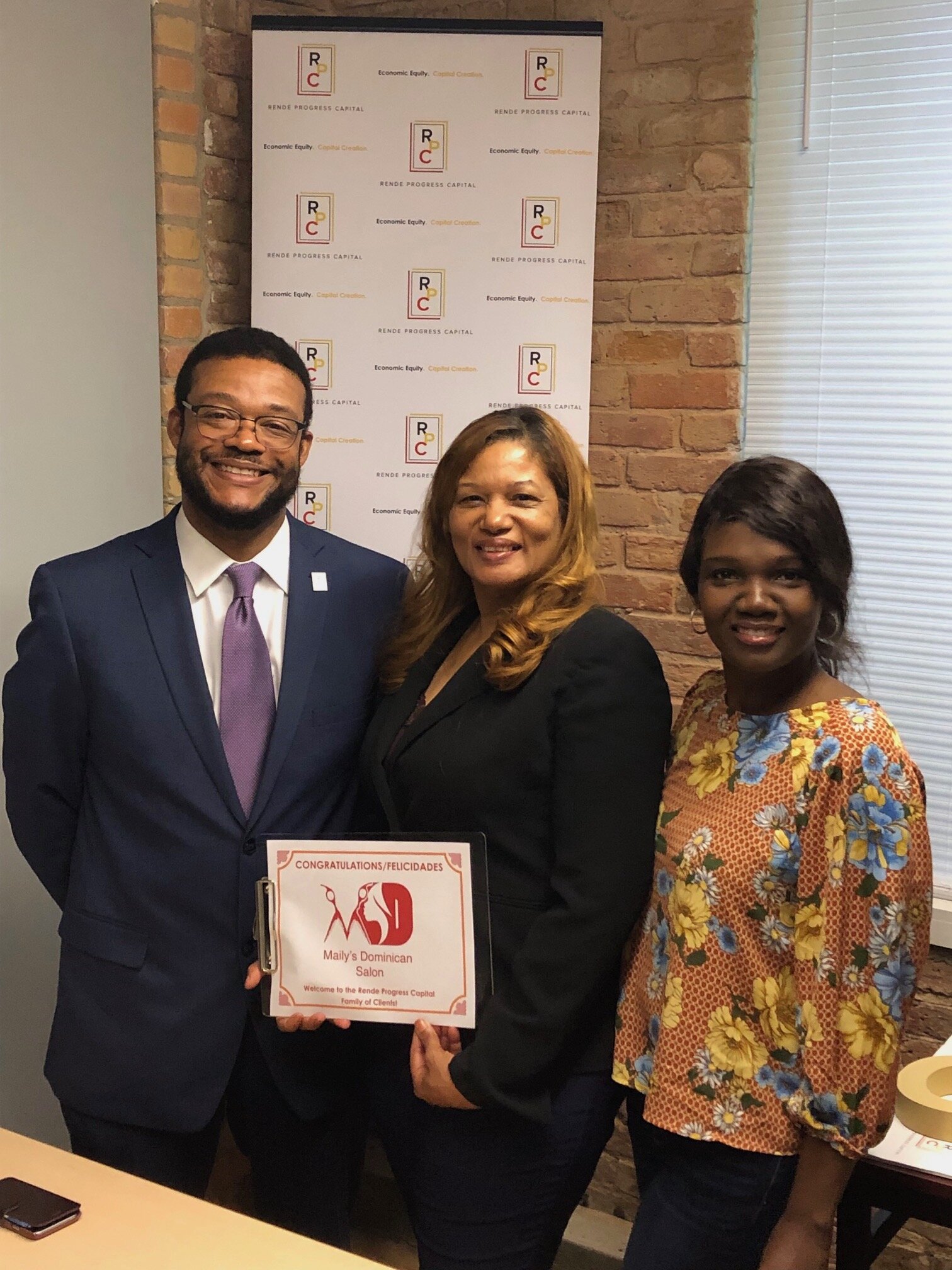 (From left to right): Eric Foster, Managing Director for Rende Progress Capital; Clara Guevara, Owner of Maily's Dominican Salon; and Ana Jose, Program Manager for the West Michigan Hispanic Chamber of Commerce