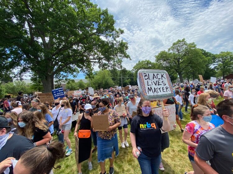 After the rally, protesters begin their walk to the Unity Bridge.