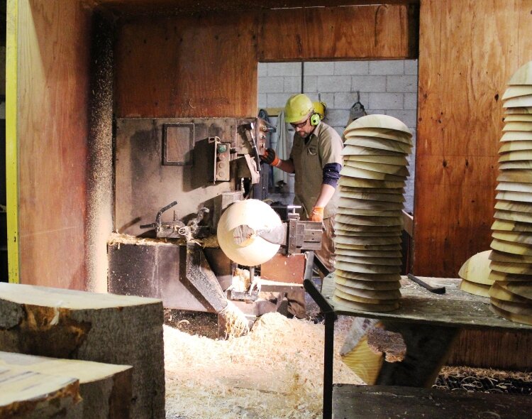 The Holland Bowl Mill turns out an average of 800 to 1,000 wooden bowls per week. 
