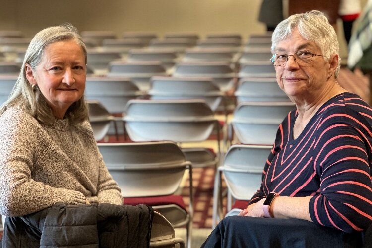 Mary Scott and Vicki Merkel stay to talk after a AARP Learn A Latte event at the KDL Cascade branch. 