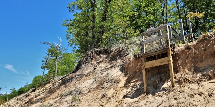The stairway to the beach at Kirk Park falls victim to a shrinking dune.