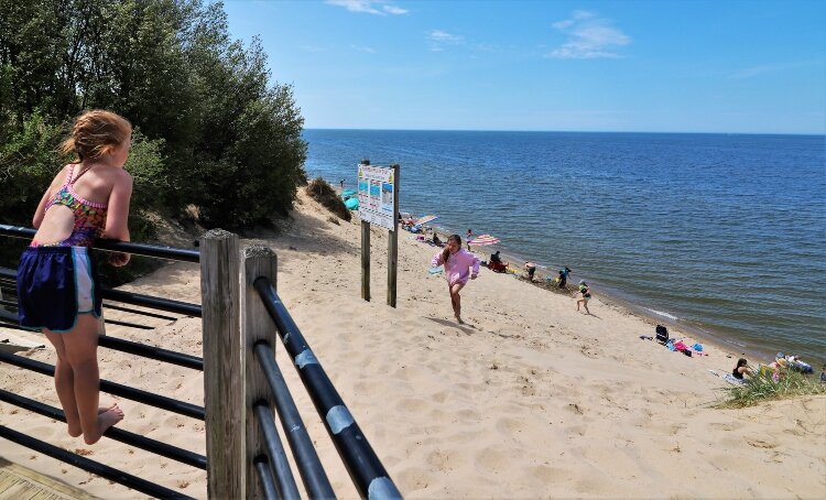 The Tunnel Park beach on Memorial Day shows the effects of high-water erosion.