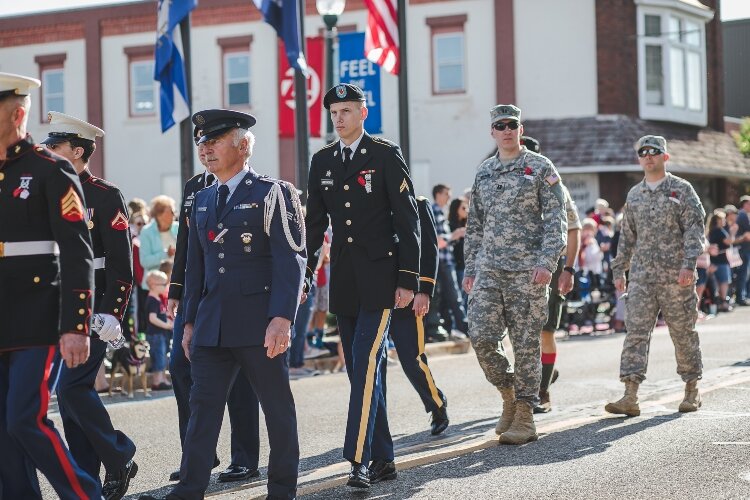Veterans walk in Zeeland Memorial Day Parade in 2019. 