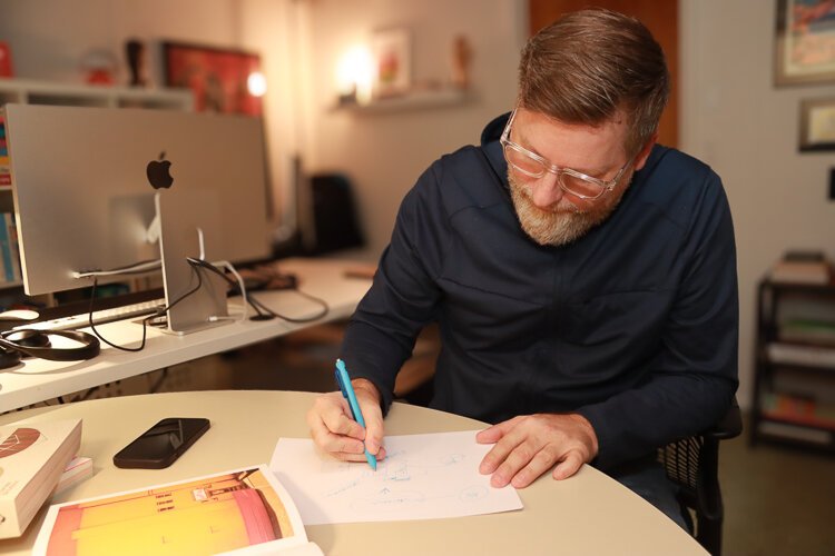 Michael Nÿkamp in his studio demonstrating core strengths of design that we often all learn as children in elementary school. 