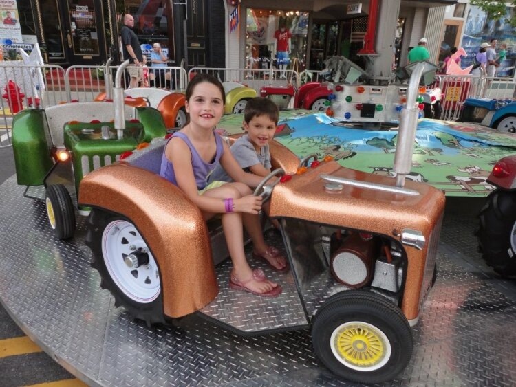 Kyle Moroney's children, Peyton and Carson, enjoying the festival in 2012. 