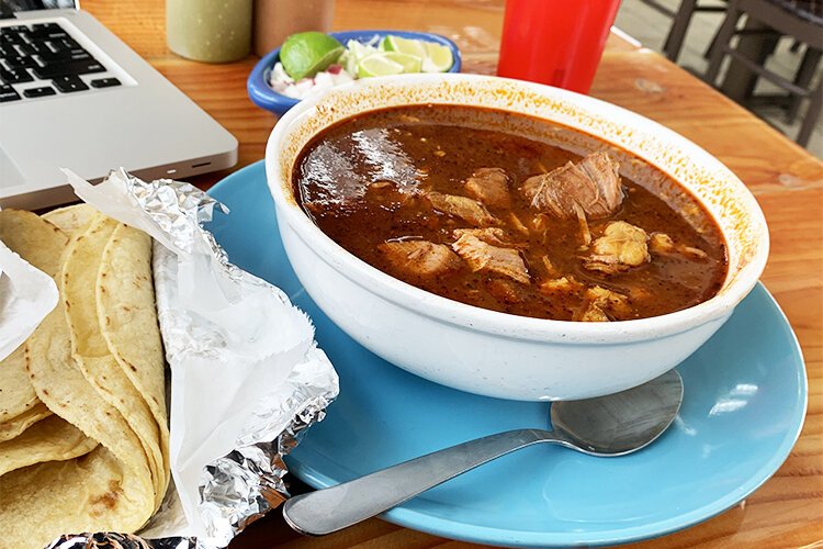 A hot bowl of pozole from El Toro Bravo