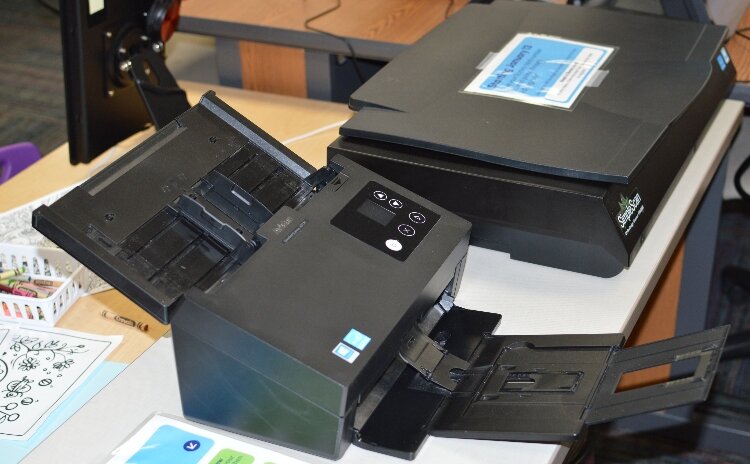 KDL offers free printing (up to 50 pages per week), scanning, and faxing.