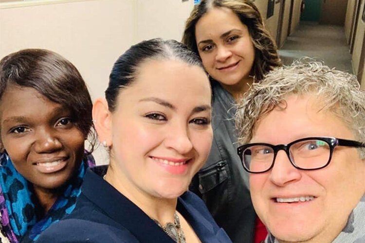 WMHCC's Ana Jose, sisters Marielena and Salvia Cano, and Tommy Allen post WGVU radio interview selfie.