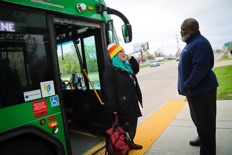 Even while on break at the 60th Street Park 'n' Ride, driver Monroe O'Bryant helps riders connect with The Rapid.