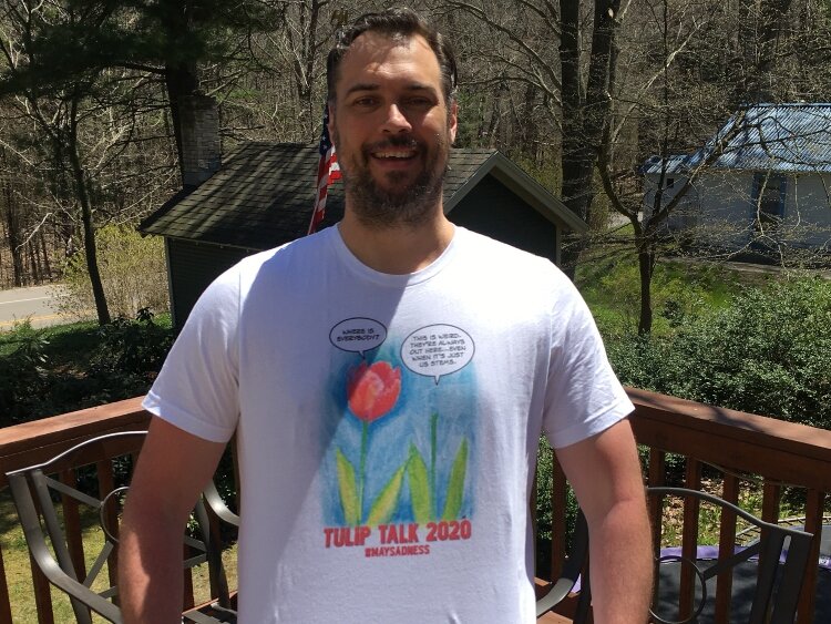Wade Gugino wears the TULIP TALK 2020 shirt he designed. 