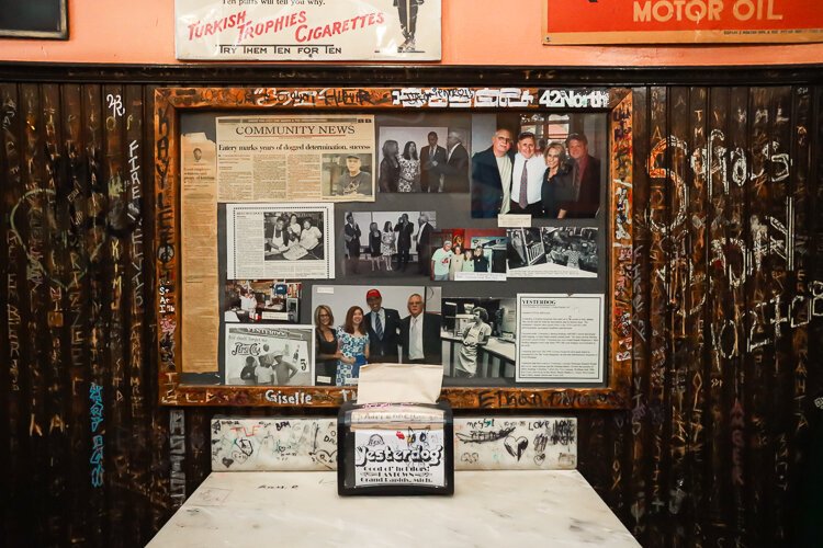 A typical booth at Yesterdog always includes plenty of community imagery collected over the years. 