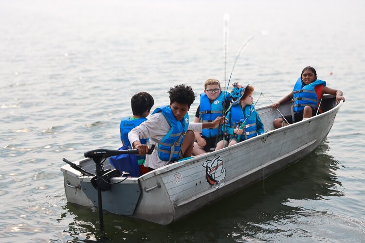 Michigan's more than 11,000 lakes provide a fitting setting for future anglers at Hudson's Fishing Camp.