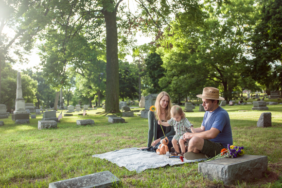 The Farrars at a family member's gravesite.