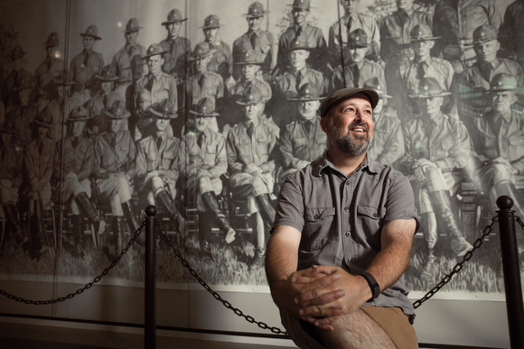 Chris LaPorte in front of  “Cavalry, American Officers, 1921.” 