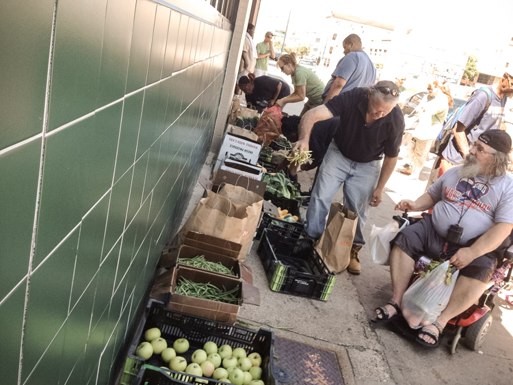 Heartside residents enjoy food from the Heartside Gleaning Initiative.