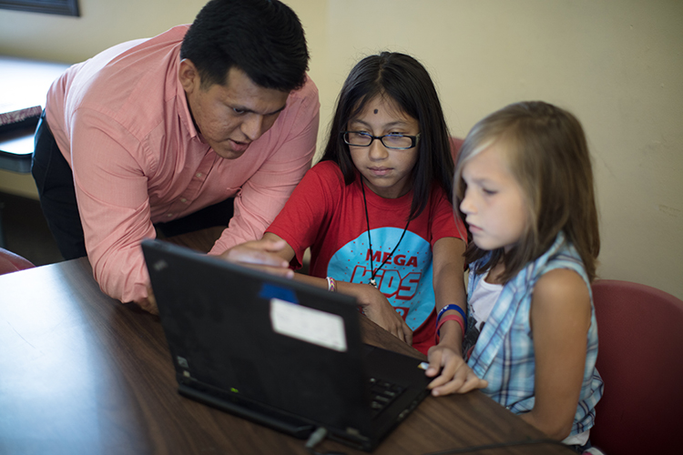 Kids learn coding through at The Loop Coding Center.