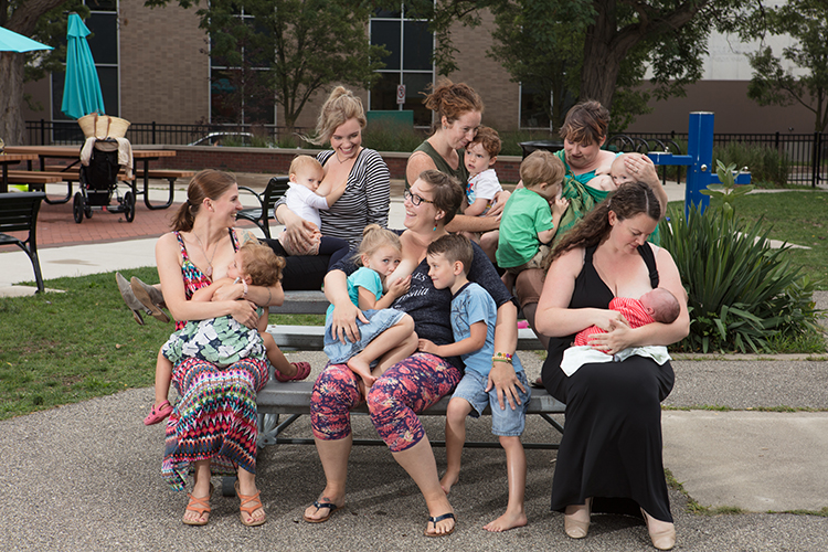 Mothers of a breastfeeding support group meet at Cherry Street Park.