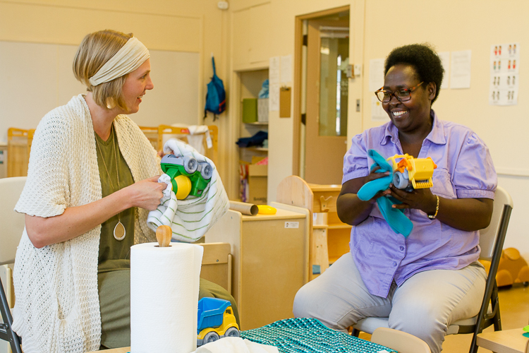 Susan Kragt, left, works with Basalissa Uwera at the Refugee Education Center.