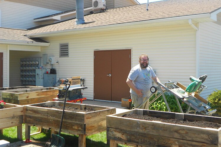 Bates Place Staff Member and garden box builder, Luke DeHaan.