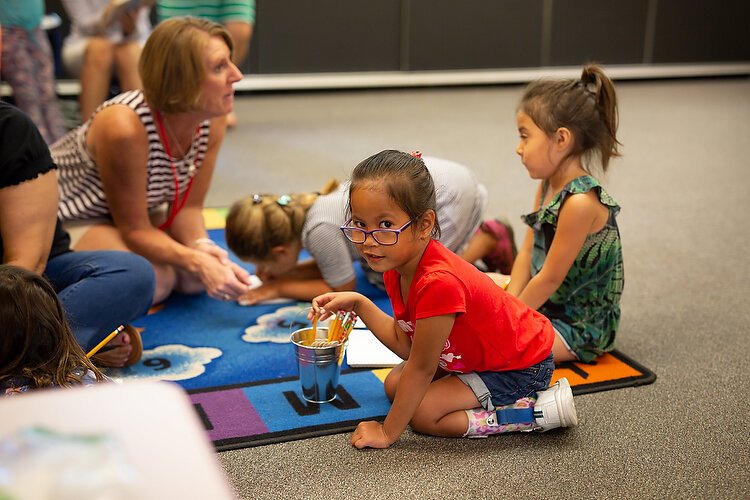 Children take part in a lesson at Ready for School summer readiness camp at Maplewood Elementary School.