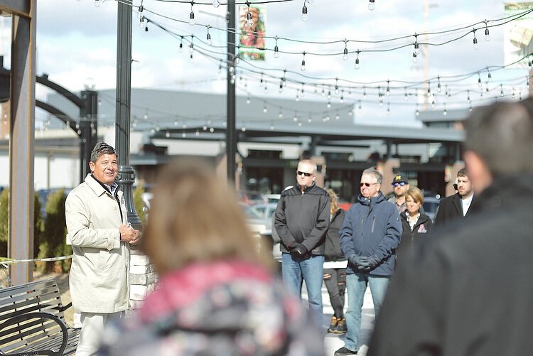 Longtime developer Scott Geerlings, shown at a recent dedication of a Hudsonville project, is working with Housing Next on several Holland area projects that include an affordable housing component.