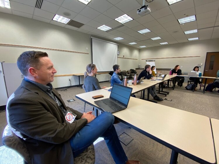 Patrick Moran meets with other nonprofit leaders to discuss how to meet community needs in the wake of the COVID-19 outbreak.