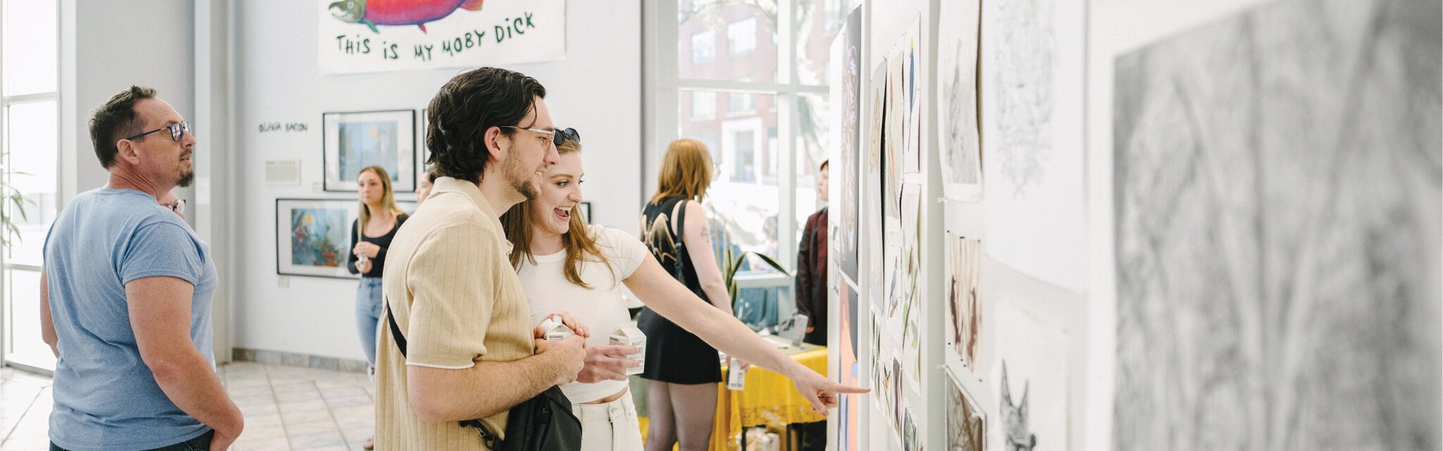 Visitors explore the Annual Student Exhibition at FSU's Kendall College of Art and Design.