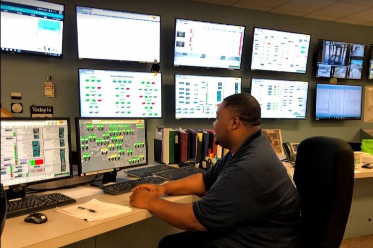 A Grand Rapids employee at work in the control room of the city's water department. 