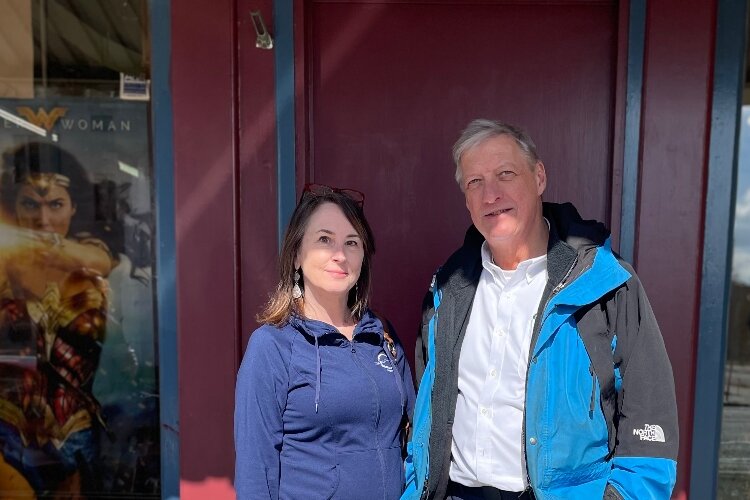 Kelly Linton and Paul Ecklund stand together in downtown Kalamazoo. 