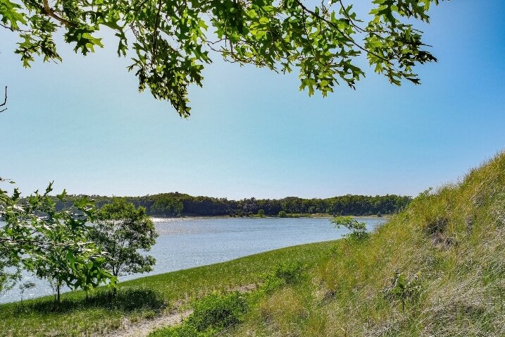 The current Dune Harbor Park includes a 2.3 mile trail around the small inland lake.