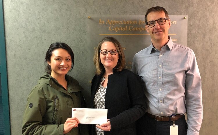 Gentex presents a shelter grant to Resilience: Advocates for Ending Violence, based in Holland.