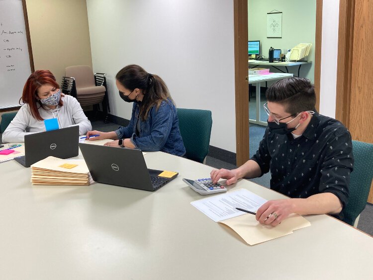 Good Samaritan Ministries is administering the MSHDA COVID-19 eviction diversion program. Pictured (from left) are Good Sam team members Virgenmina Calo, Jessi Christensen, and Andrew Zokoe.