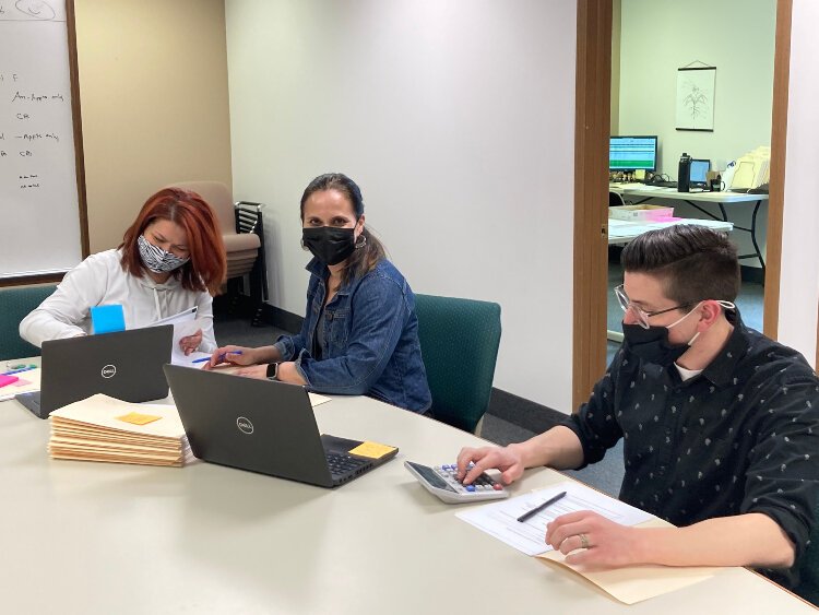 Good Samaritan Ministries is administering the MSHDA COVID-19 eviction diversion program. Pictured (from left) are Good Sam team members Virgenmina Calo, Jessi Christensen, and Andrew Zokoe.