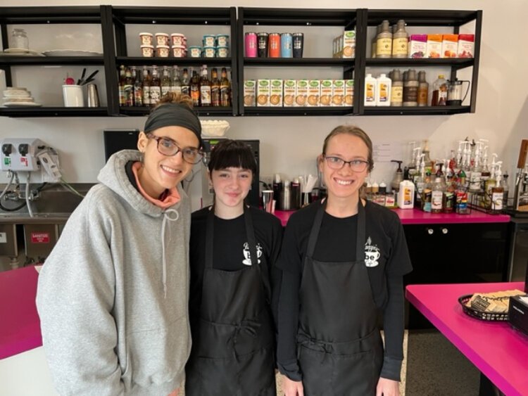 Employees of Kenzie's Be Café pose for a picture. From left, manager Haley Langejans, Marisa Nicolet, and Kendra Schreur.