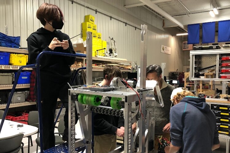 Robotics students learn skills with a hands-on approach.