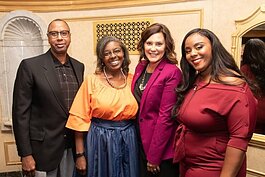 Jocelyn Hines (right) poses with her parents (left) and Gov. Gretchen Whitmer after Hines received the 2019 Youth Volunteer of the Year award.